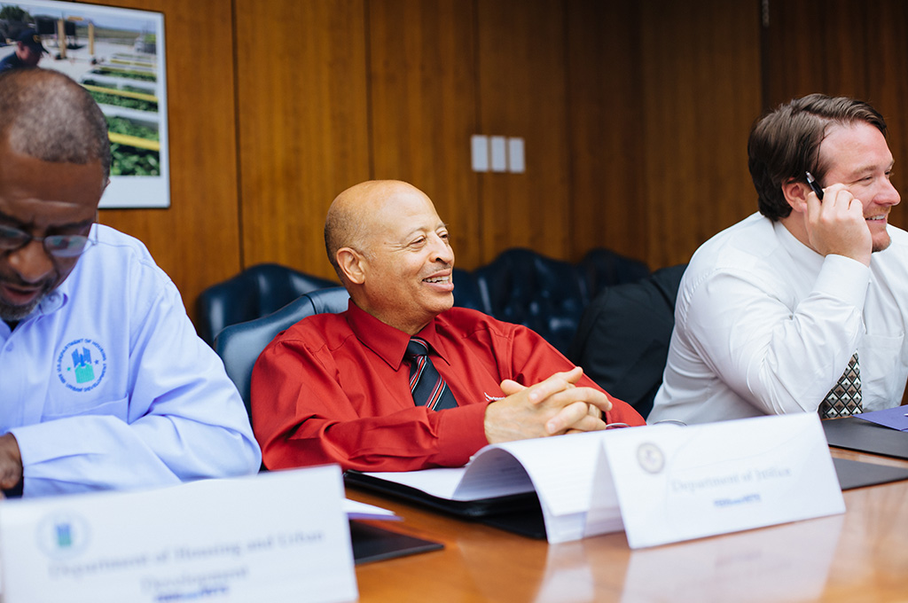 Cortez Puyear -DOJ VEPM (center) laughs it up with Dennis Hicklin-USAID VEPM (left) and Sean Lenahan-DOS VEPM (right)