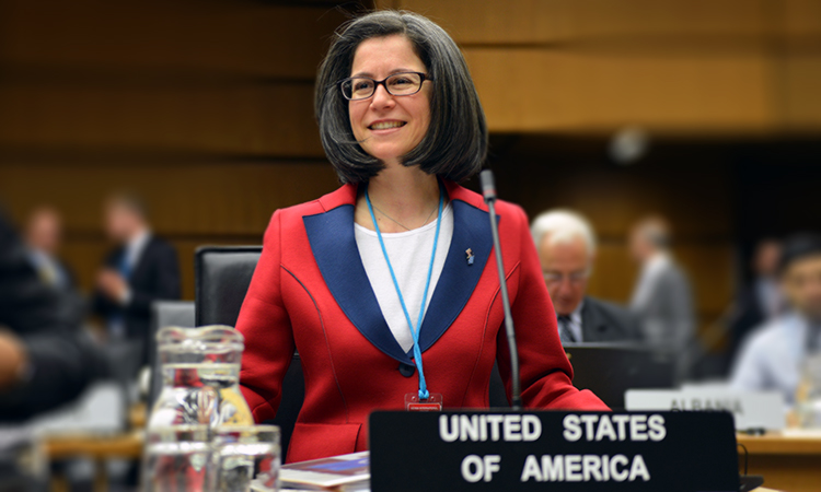 Female official representing the U.S. at an international conference on nuclear issues.