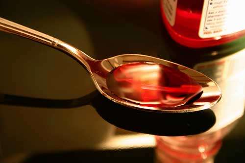 cough syrup in a spoon