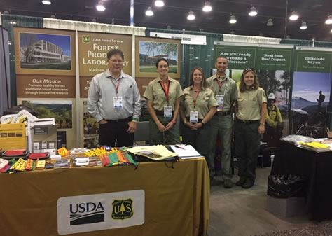 Forest Service personnel staff the booth at the AISES National Conference.