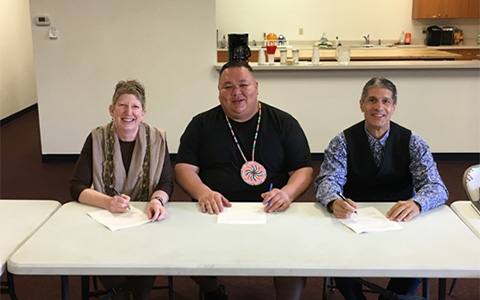 Leanne Marten (R1 Regional Forester), Gary Aitken Jr. (KTOI Chairman), and Glenn Casamassa (R6 Regional Forester).