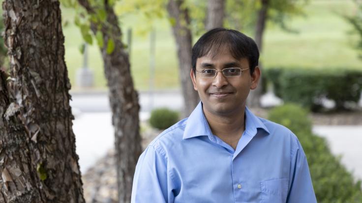 Suman Debnath is using simulation algorithms to accelerate understanding of the modern power grid and enhance its reliability and resilience. Credit: Carlos Jones/ORNL, U.S. Dept. of Energy