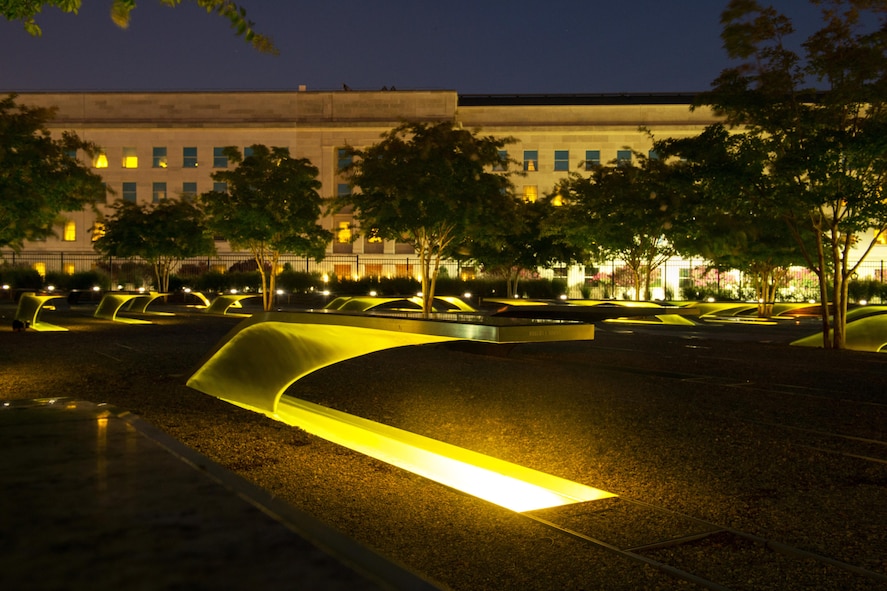 Lights illuminate memorial benches at the National 9/11 Pentagon Memorial.