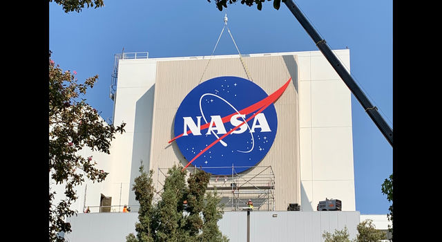 The sign, as seen from a distance, on JPL'S Spacecraft Assembly Facility