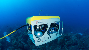 Mohawk ROV operating in blue water above the reef