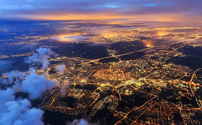 Aerial cityscape view of the city of Leiden, the Netherlands, after sunset at night 