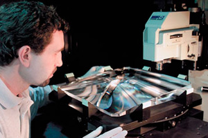 <h3>Final Optics</h3>The NIF <a href="/about/how-nif-works/beamline/final-optics"> final optics assembly</a> uses plates cut from large potassium dihydrogen phosphate (KDP) crystals to convert laser light from infared to ultraviolet, which is a more favorable wavelength for fusion experiments. The system also focuses the laser light to the center of the Target Chamber.<br/><br/><a href="content/assets/images/media/photo-gallery/large/nif-0202-04191dp_48.jpg" target="_blank">Download hi-res image</a><br/><a href="/media/photo-gallery?id=nif-0202-04191dp_48">Direct Link</a>