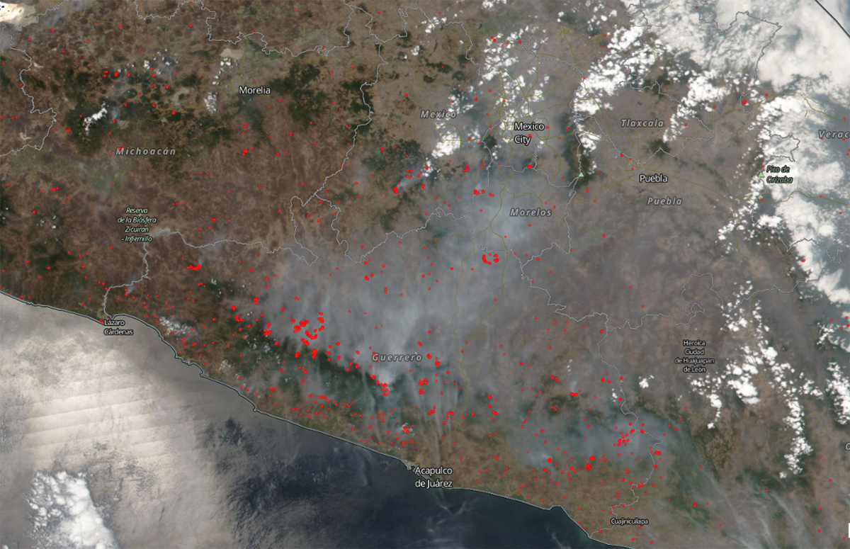 True color image showing south west Mexico with red dots to show where high temperatures were detected by VIIRS.