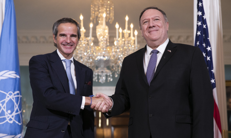 Secretary of State Mike Pompeo, right, shakes hands with Director General of the International Atomic Energy Agency (IAEA) Rafael Mariano Grossi from Argentina, Tuesday, Feb. 4, 2020, at the State Department in Washington. (AP Photo/Jacquelyn Martin)