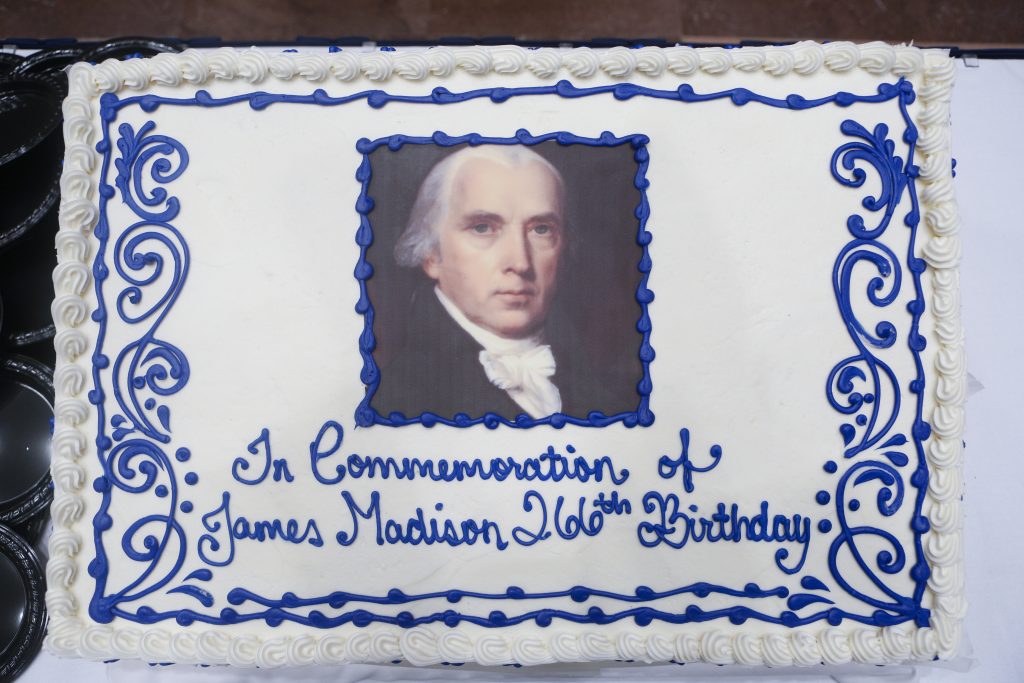 A cake from the Law Library commemorates President James Madison's 266th birthday in Madison Hall, March 16, 2017. Photo by Shawn Miller.
