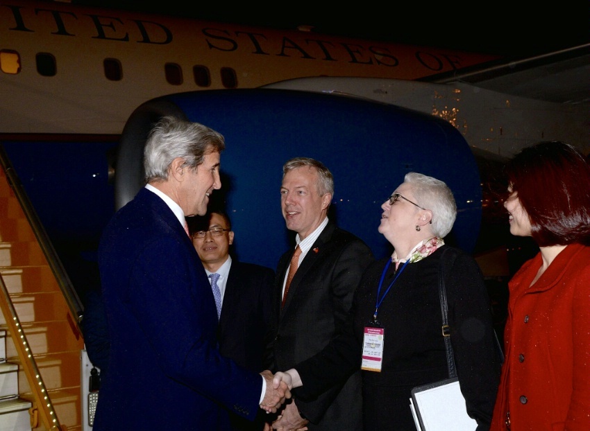 Secretary Kerry Is Greeted by Deputy Chief of Mission Sutton Upon Arrival in Hanoi