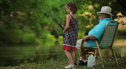 Grandaughter and Grandad fishing nearby AFRH