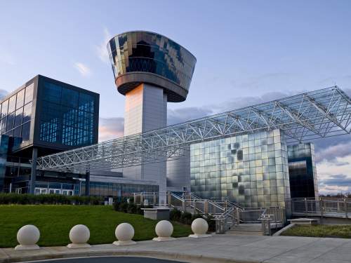 Image of the entrance of the Steven F. Udvar-Hazy Center and the Engen Observation Tower.