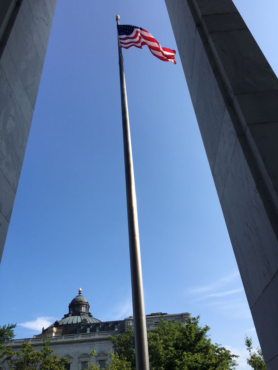 Flag in front of the Madison / Photograph by Andrew Weber