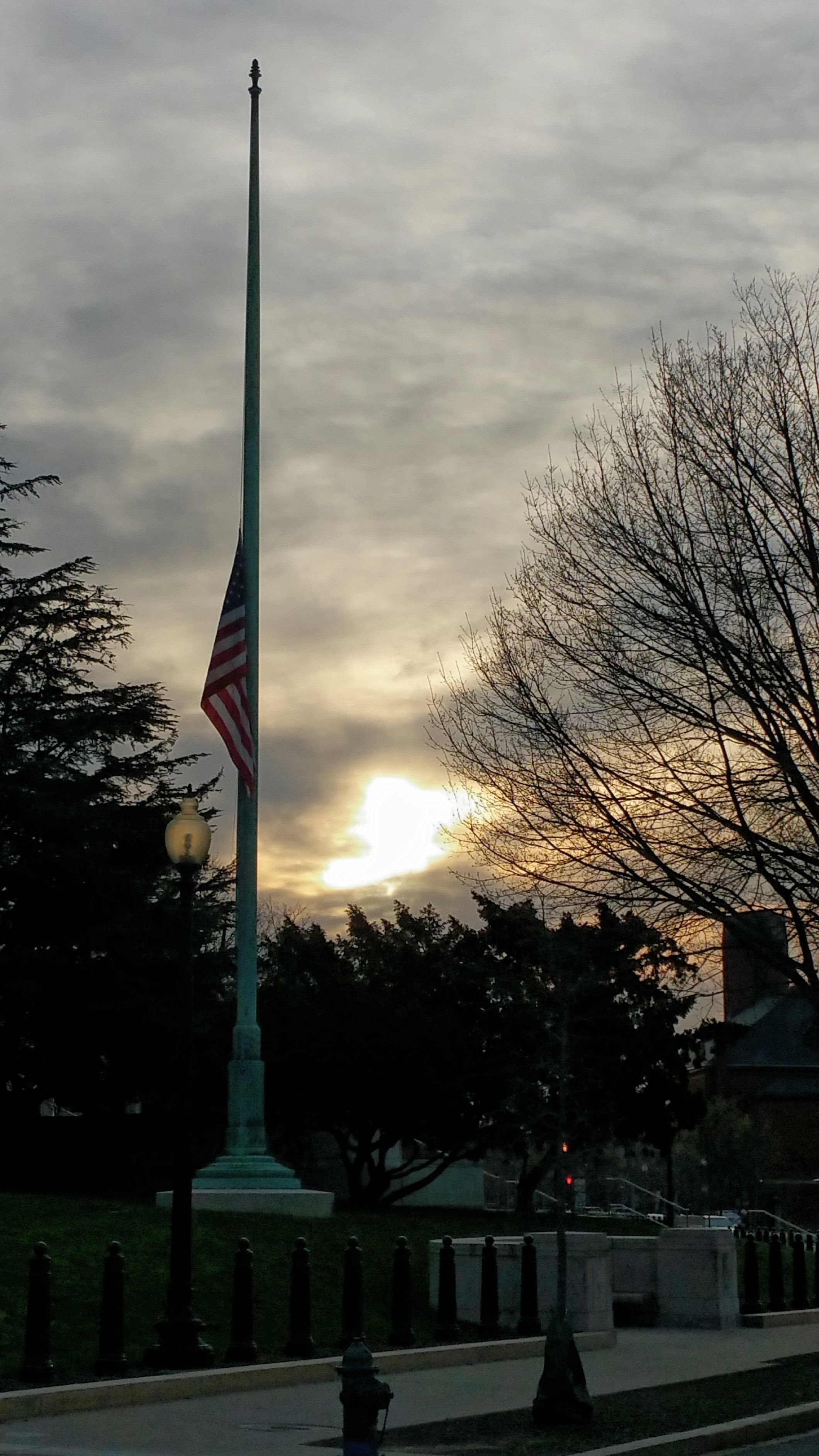 Flag at half mast on the south side of the Library of Congress Adams Building / Photograph by Kimberly Allen