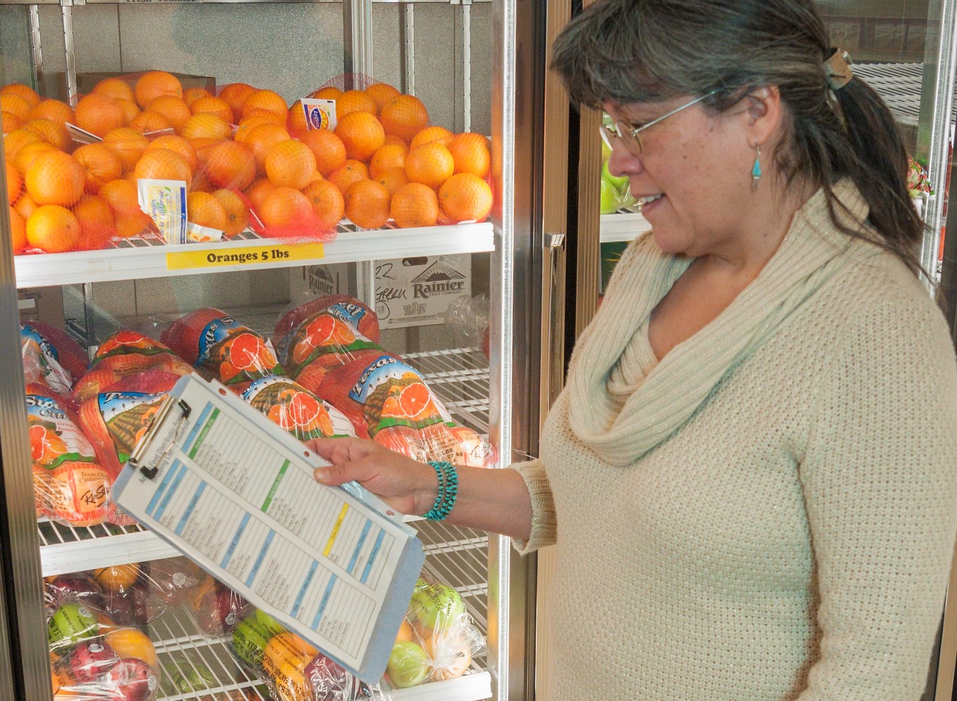 Woman shopping for produce