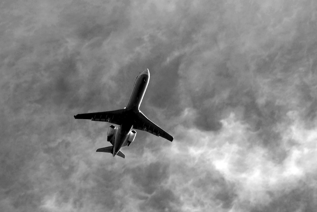 Jet under the clouds