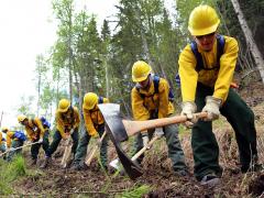 EFF crew lined up doing rehab work in Alaska