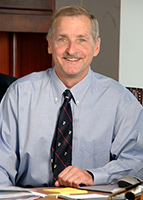 Headshot of Dr. James Battey.