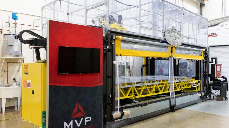 The Reactive Additive Manufacturing, or RAM, machine for large-scale thermoset printing supports two technologies licensed by MVP and developed in collaboration with ORNL. Credit: Carlos Jones/ORNL, U.S. Dept. of Energy.