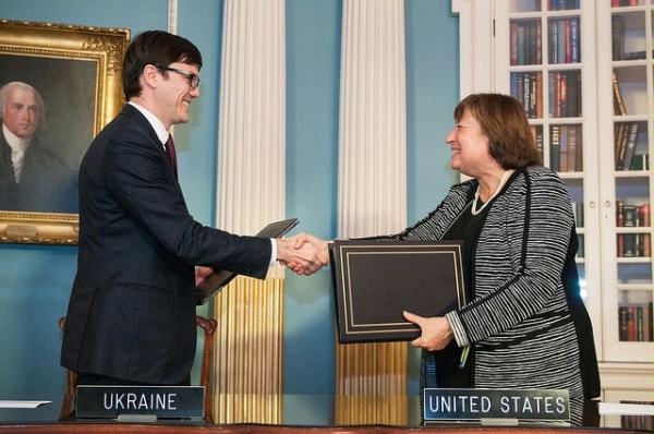 Under Secretary Novelli and Ukrainian Infrastructure Minister Andriy Pyvovarsky shake hands after signing an Open Skies Agreement between the United States and Ukraine that will promote increased travel and trade, enhance productivity, and spur high-quality job opportunities and economic growth, at the U.S. Department of State.