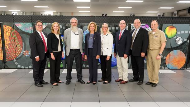 While visiting Argonne, Under Secretary Gordon-Hagerty toured the Advanced Leadership Computing Facility, which is the future home of Aurora, set to be the nation’s first exascale system. From left to right: Keith Bradley, Megan Clifford, Mike Papka, Lisa E. Gordon-Hagerty, Joanna Livengood, Pete Hanlon, John Stevens and Christopher Osborn. (Image by Argonne National Laboratory.)