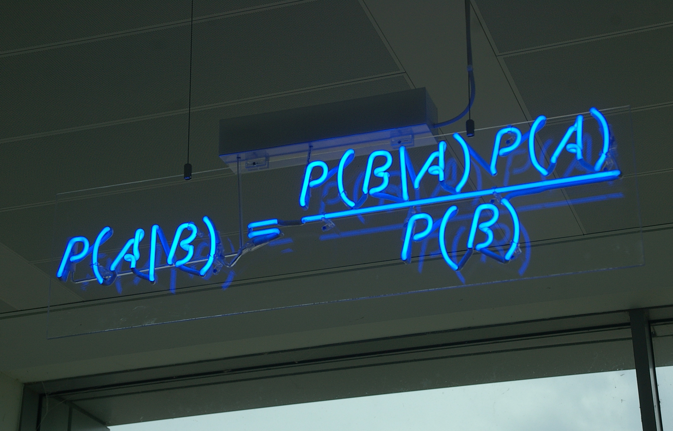 An image in neon of Bayes' theorem