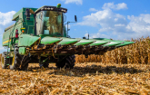 John N. Mills, Jr. drives the farm's smaller six-row corn harvester during the feed corn harvest at the John N. Mills & Sons farm. USDA photo by Lance Cheung.