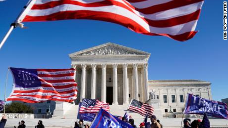 People participate in a &quot;Stop the Steal&quot; protest outside the U.S. Supreme Court in support of U.S. President Donald Trump in Washington, U.S., December 8, 2020. REUTERS/Erin Scott