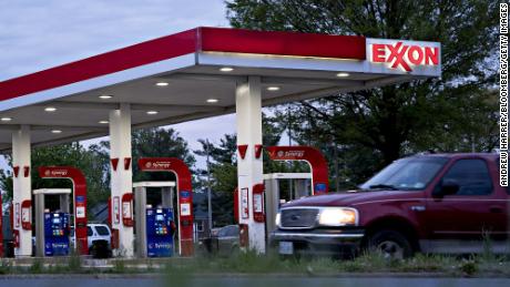 A vehicle passes an Exxon Mobil Corp. gas station in Falls Church, Virginia, U.S., on Tuesday, April 28, 2020. Exxon is scheduled to released earnings figures on May 1. Photographer: Andrew Harrer/Bloomberg via Getty Images