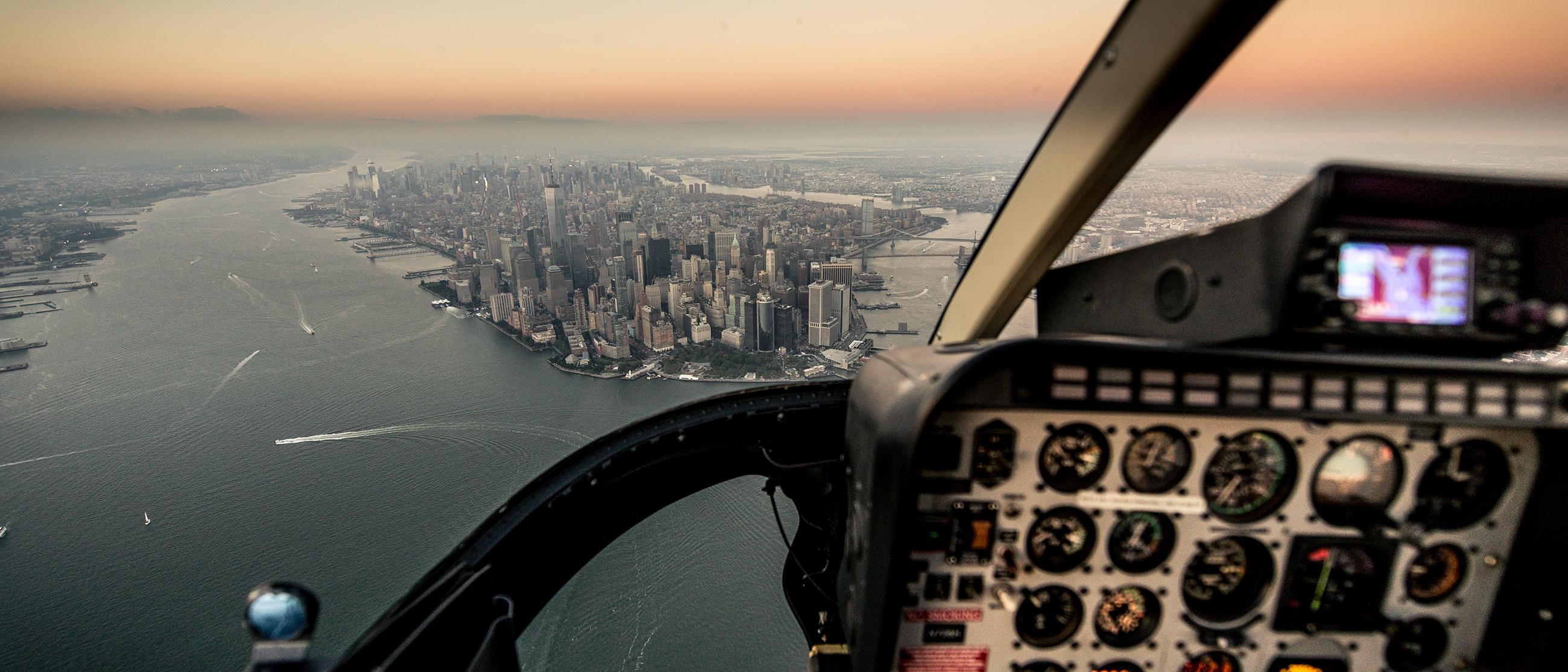 A view of New York City from inside a helicopter.