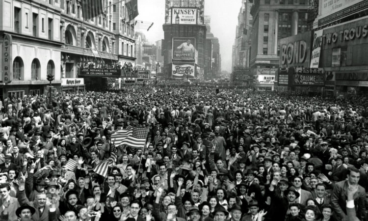 Looking north from 44th Street, New York's Times Square is packed Monday, May 7, 1945, with crowds celebrating the news of Germany's unconditional surrender in World War II. (AP Photo/Tom Fitzsimmons)