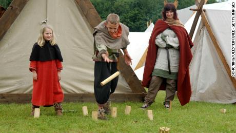 In Oldenburg, Germany, children play kubb in the archaeological project &quot;Slawenland&quot; (Slav land), a rebuilt historic camp of the Vikings and Slavs.