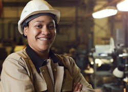 A woman in a hardhat