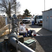 Hydrologist Michael Land is shown sampling a public supply well in the upper Santa Ana watershed.