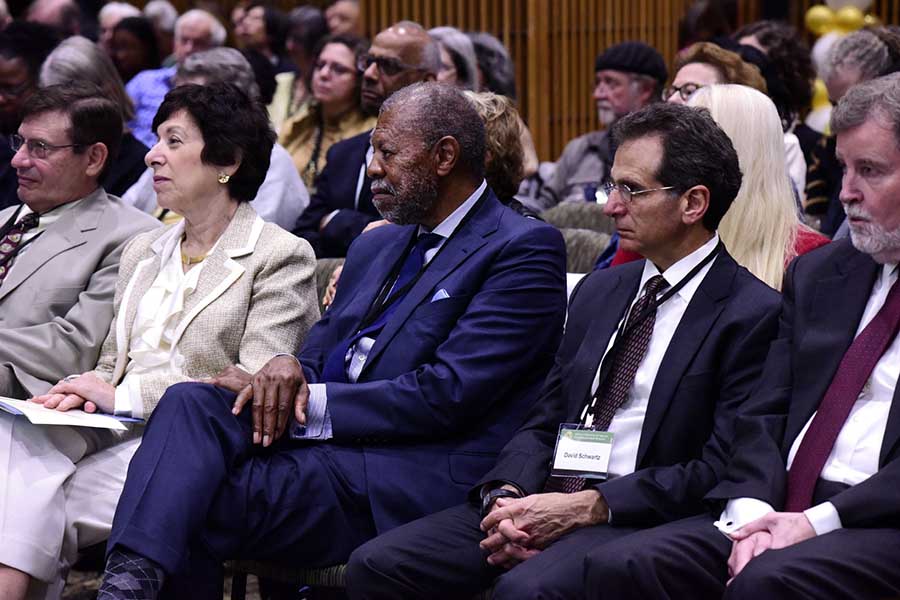 Dr. Birnbaum, together with her husband, David and some of the Champion Awardees, Kenneth Olden, David Schwartz, and Sam Wilson listen intently to Ira Flatow's keynote address.