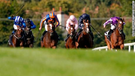 DUBLIN, IRELAND - SEPTEMBER 14: Ryan Moore riding Magical (R) win The Qipco Irish Champion Stakes from Magic Wand (orange/blue) and Anthony Van Dyck (navy blue) at Leopardstown Racecourse on Irish Champion Stakes Day on September 14, 2019 in Dublin, Ireland. (Photo by Alan Crowhurst/Getty Images)