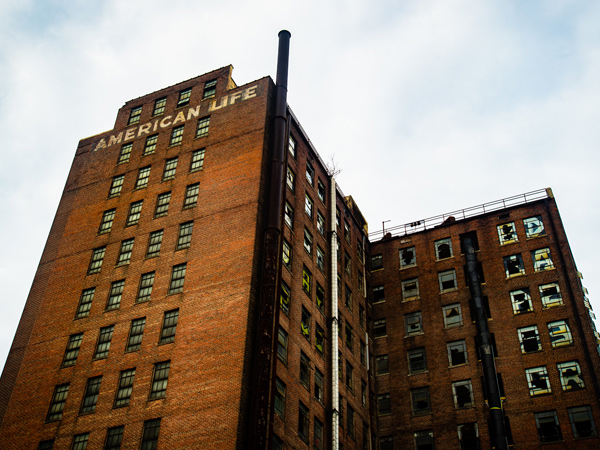 Image of a multi-story brick building.