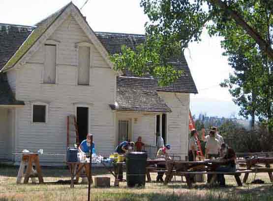 volunteers and staff restore the historic Whalley Homestead