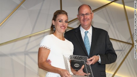 SINGAPORE - OCTOBER 21:  Angelique Kerber of Germany receives the 2016 Player of the Year Award from Steve Simon, WTA CEO during the Gala Dinner prior to the BNP Paribas WTA Finals Singapore at Marina Bay Sands on October 21, 2016 in Singapore.  (Photo by Julian Finney/Getty Images)