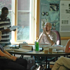 Earth to Sky group sitting at table