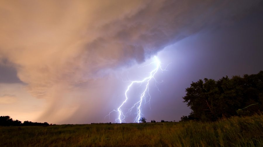 lightning from the sky striking the ground.