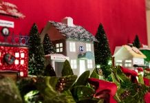 Decorated mantel topped with small replicas of buildings (White House/Andrea Hanks)