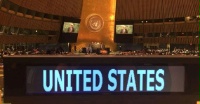 Date: 01/18/2017 Description: DipNote: A placard for the United States' delegation sits atop a table, as Secretary of State John Kerry speaks at the UN General Assembly at the United Nations headquarters in New York.  - State Dept Image