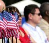 US Flags Among a Crowd