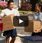 Thumbnail of father and daughter carrying boxes