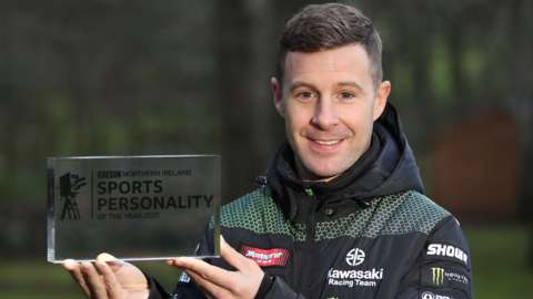 Jonathan Rea is present with the NI SPOTY trophy