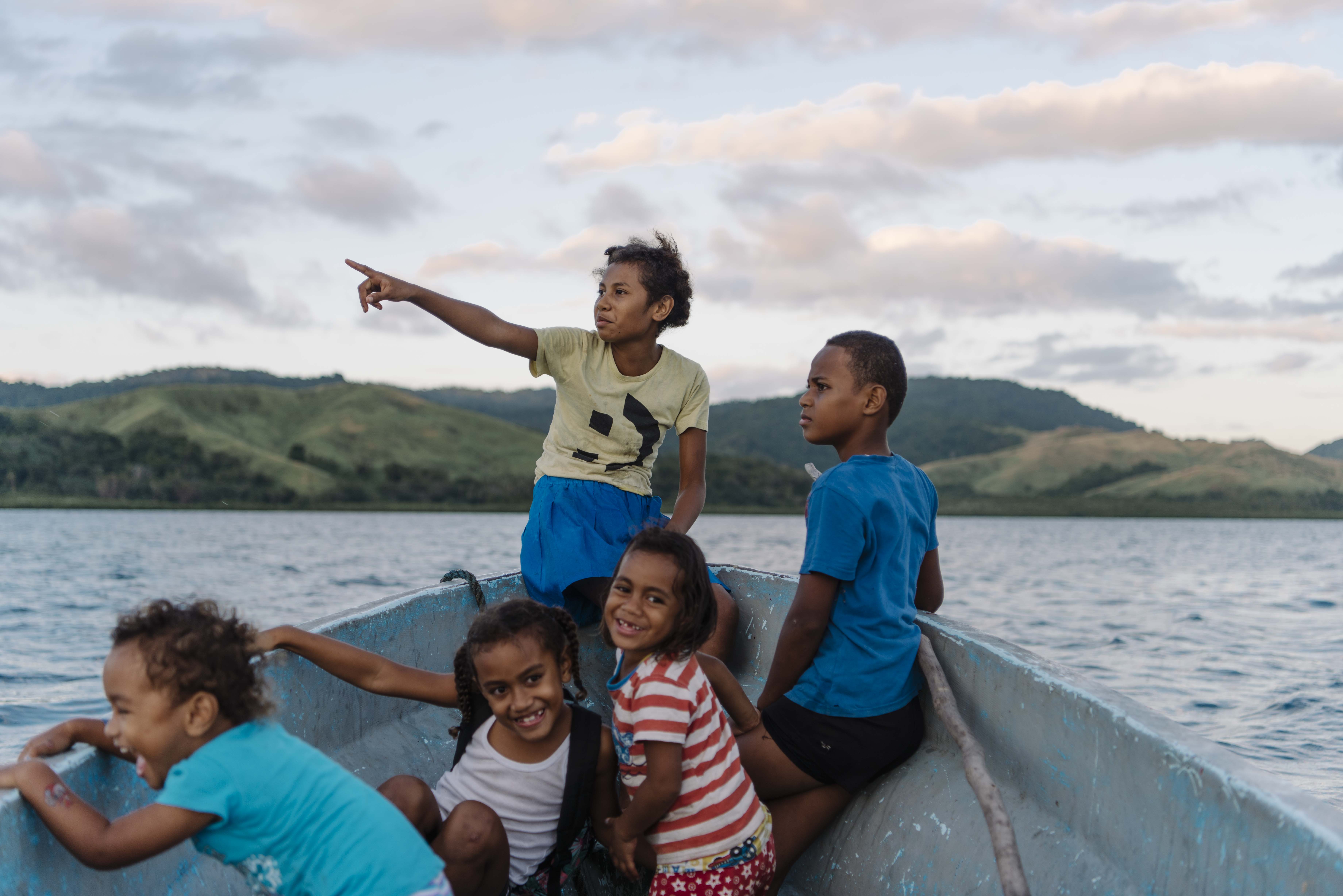 children in a boat