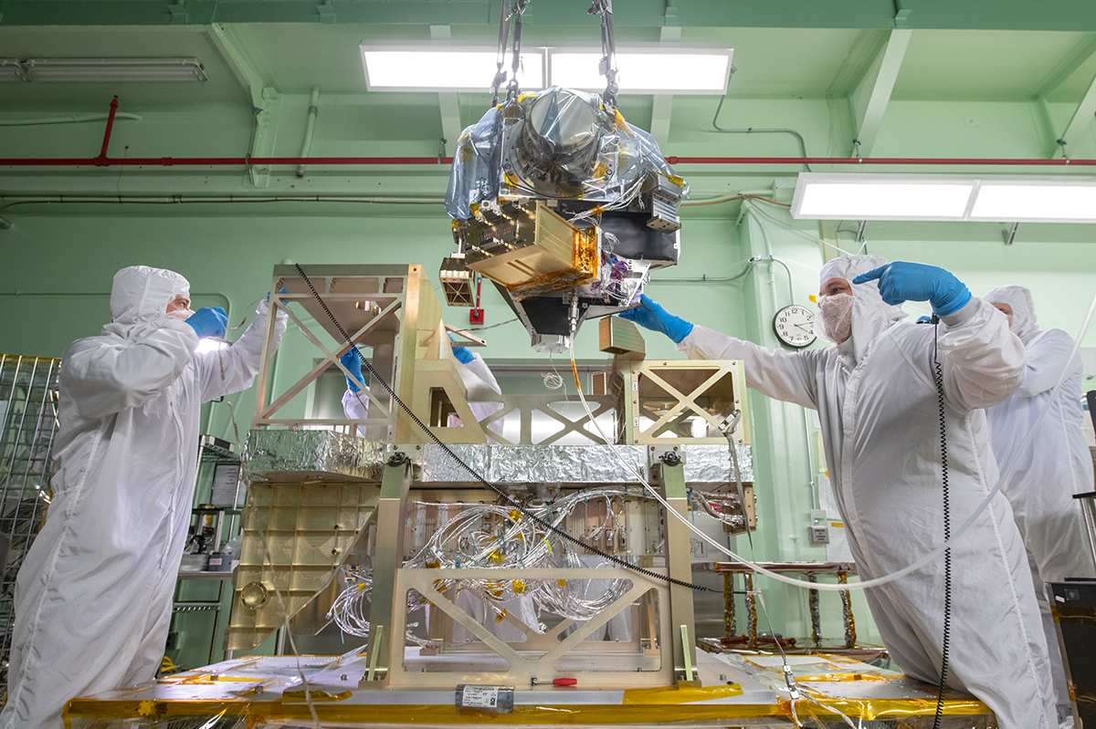 Crane lift of the ETU OM onto the OCI Primary Structure