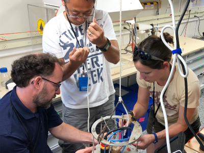 EXPORTS scientists prepare an IFC for operation on board the R/V <em>Sally Ride</em>. Credit: Michael Starobin (NASA)